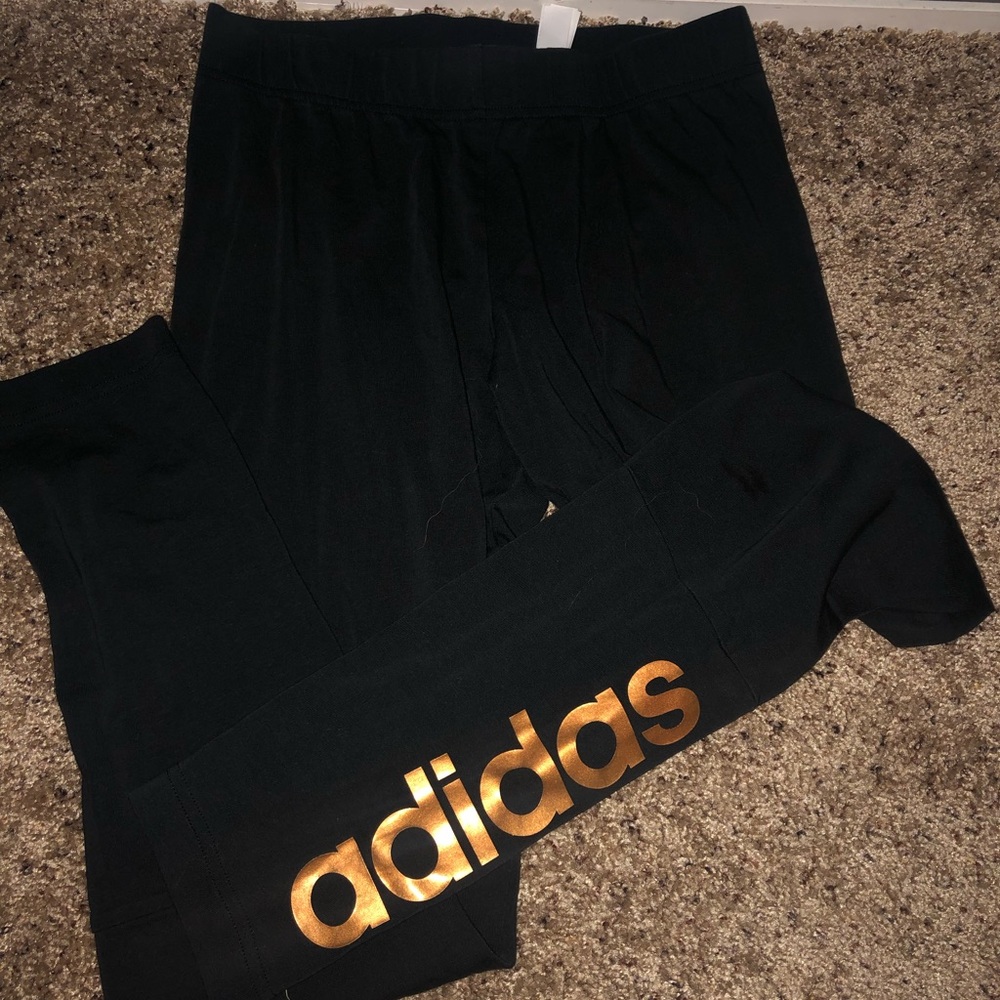 Adidas sport leggings with gold lettering